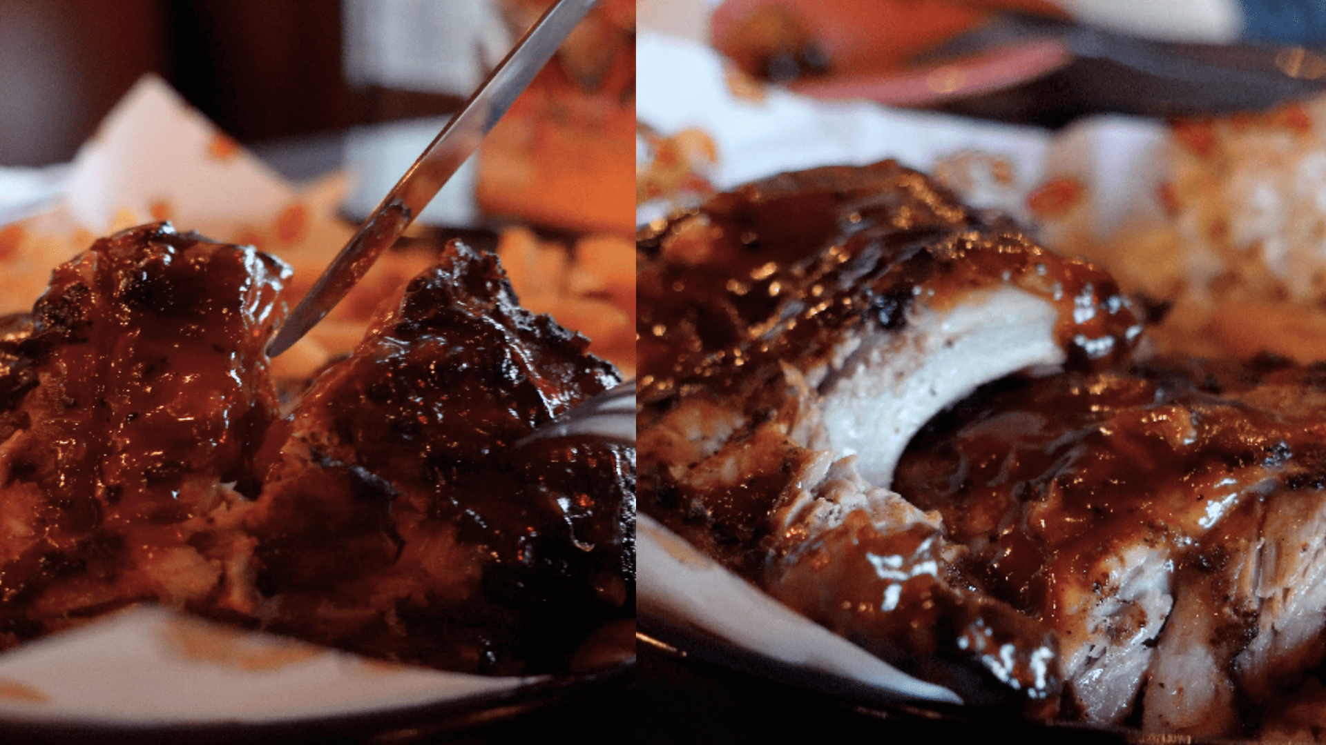 聖地牙哥 Phil's BBQ 招牌豬肋排（Baby Back Ribs）的極致特寫。畫面上展示一大塊裹滿厚重、油亮、深褐色焦糖化烤肉醬汁的肋排肉。肉質看起來極度軟嫩多汁，邊緣輕易脫離骨頭。表面反射出溫暖的光澤，並可隱約看見 Mesquite 炭火留下的微焦脆殼（Bark）與明顯的粉紅色煙燻環。